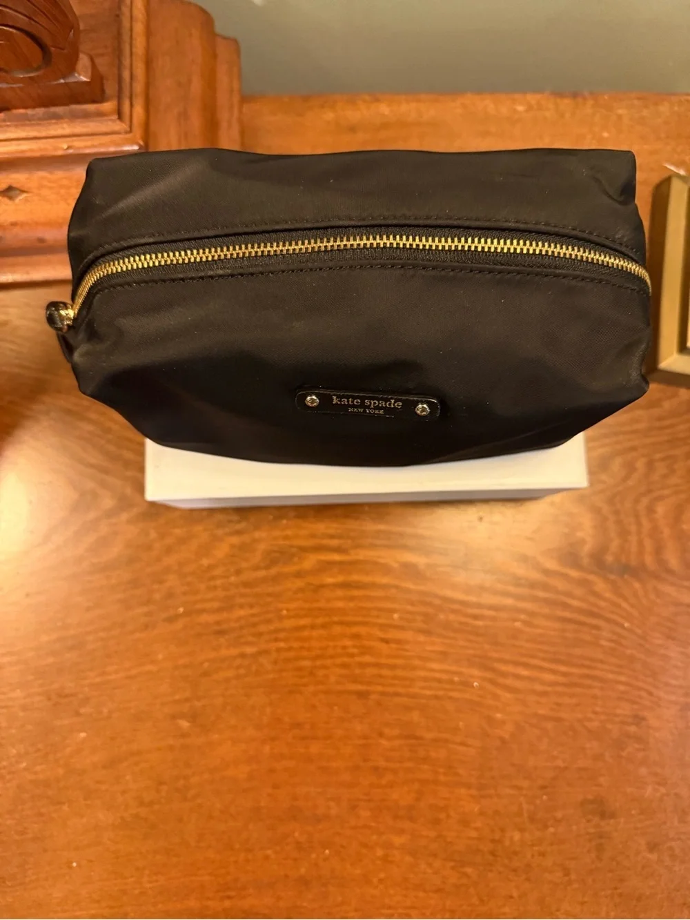 kate spade Black Nylon Cosmetic Pouch with Gold Logo Plaque